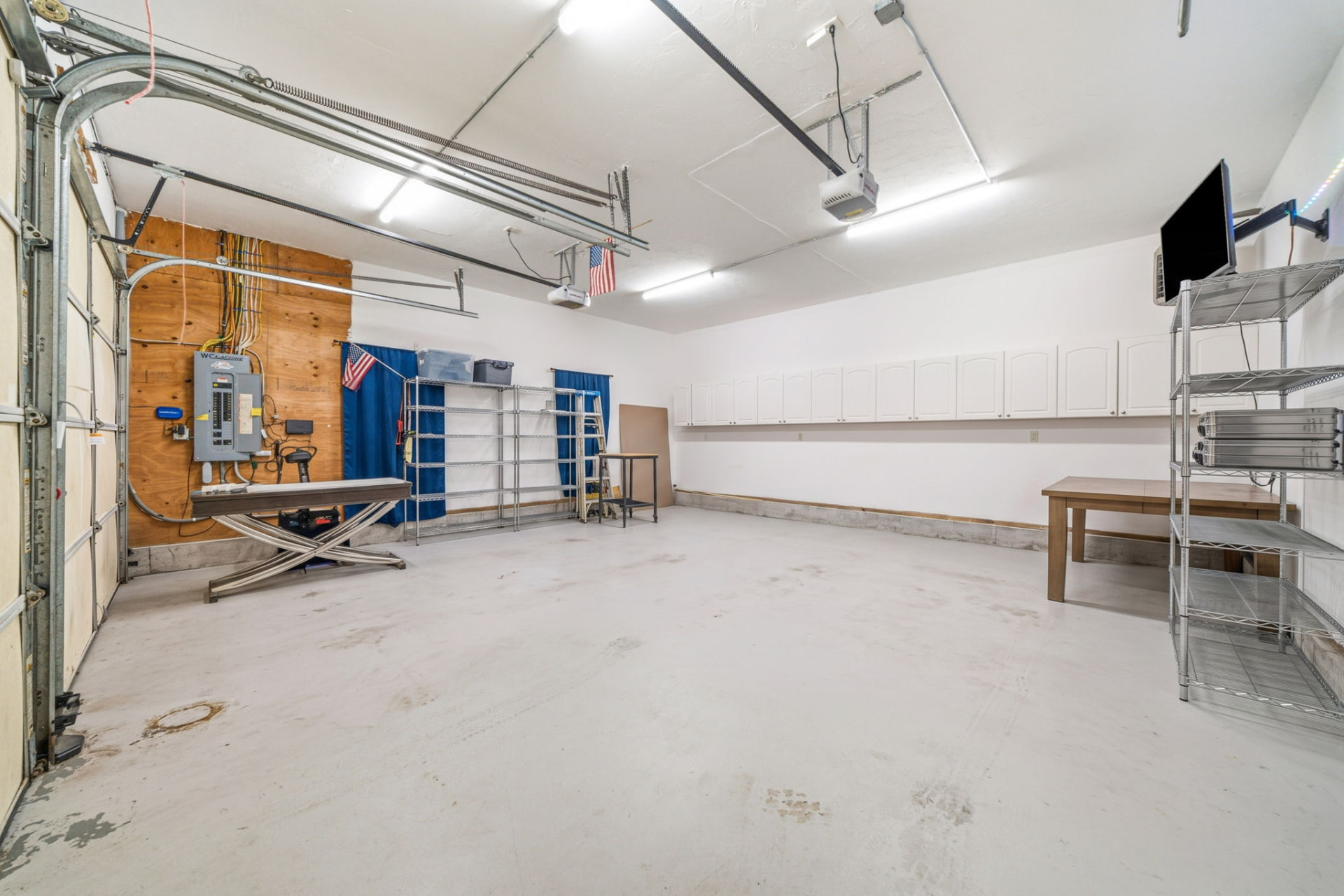 Two-car attached garage with built-in cabinetry