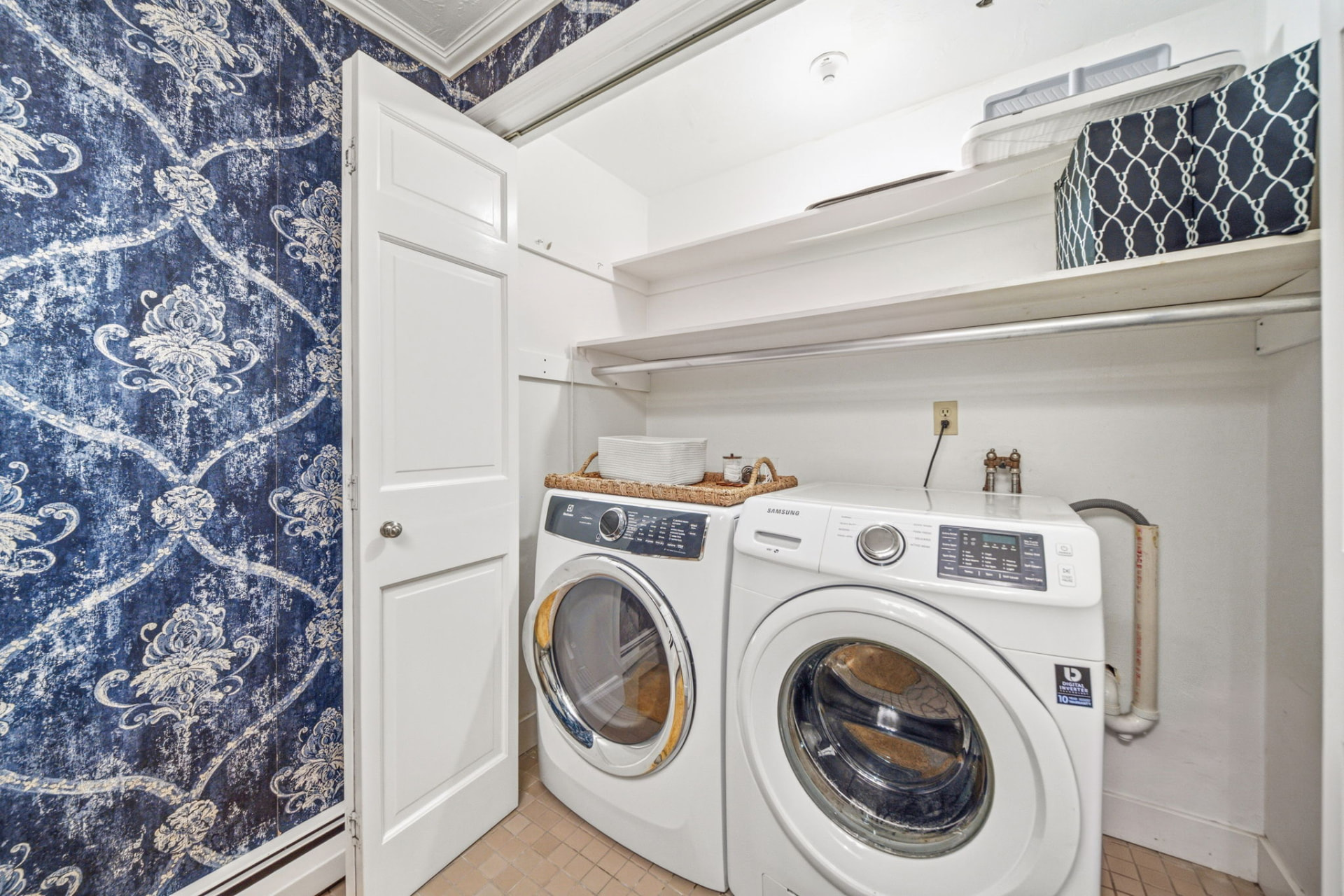 Interior laundry with full-size washer and dryer