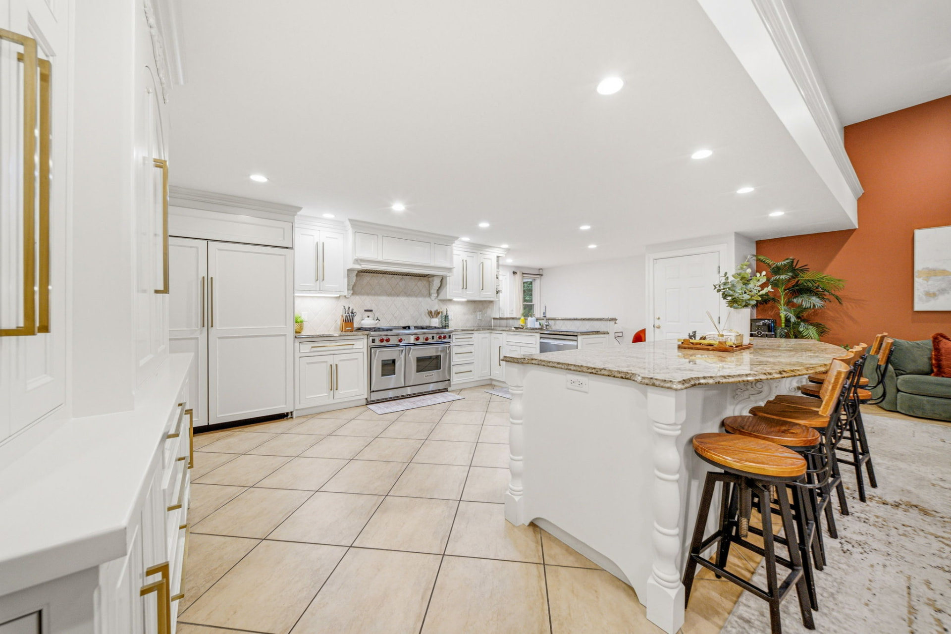 Chef's kitchen with Wolf range and granite island
